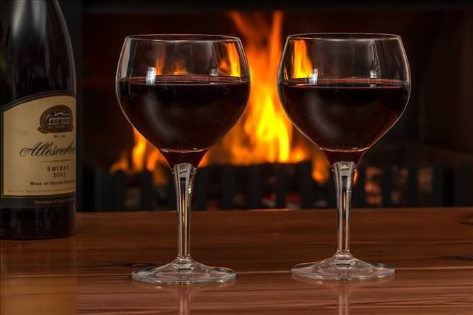 wine glasses by the fire