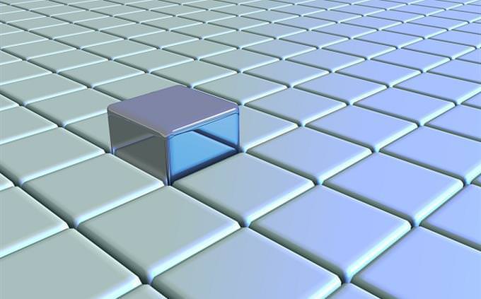 Um cubo sobre uma superfície quadrada plana
