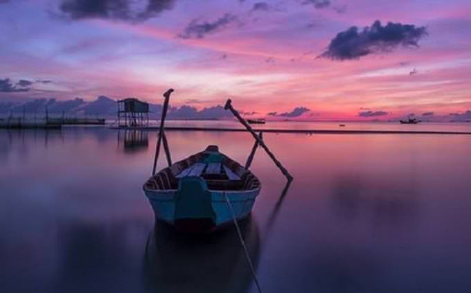 A rowboat at sunset