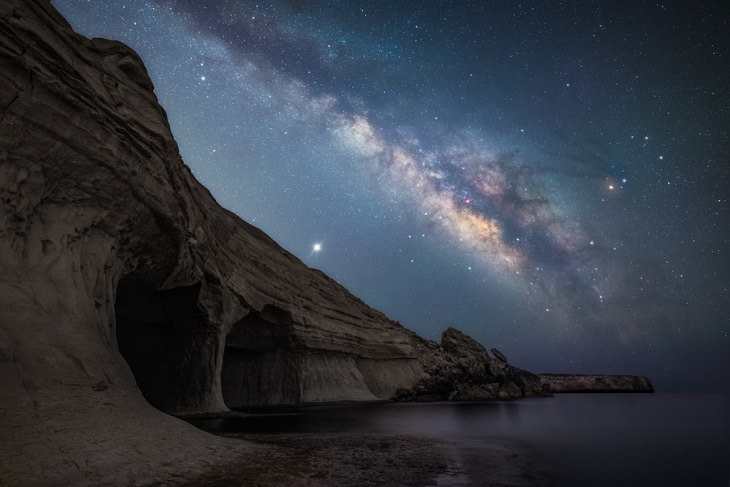 Best and colorful photographs of the Milky Way taken from different locations around the world, provided by Capture the Atlas editor Dan Zafra, “A Night at the Caves” by Sam Sciluna, taken at the Ta Marija Cave, in Malta, Italy