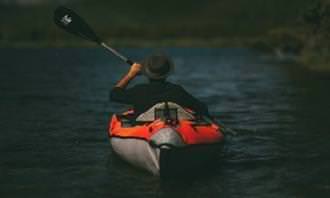 A man rowing a rowboat