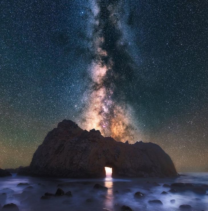 Astronomy photographs of the night sky and nightscapes by Marcin Zajac, Pfeiffer Beach Archway in Big Sur with the milky way in a vertical panorama
