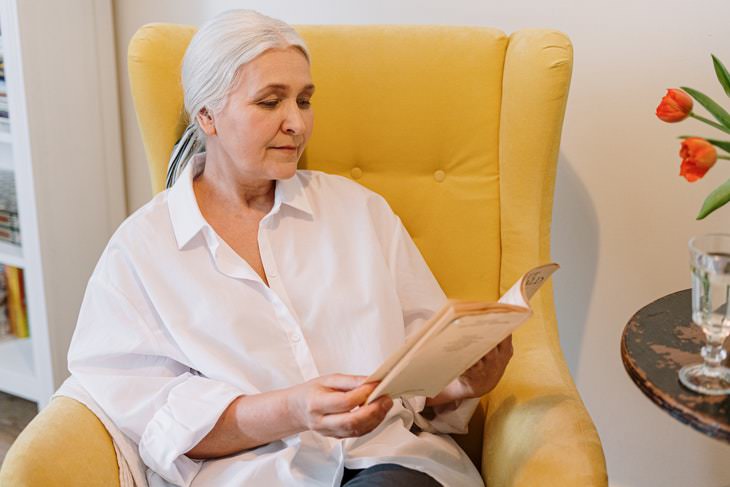 habits to look younger woman reading